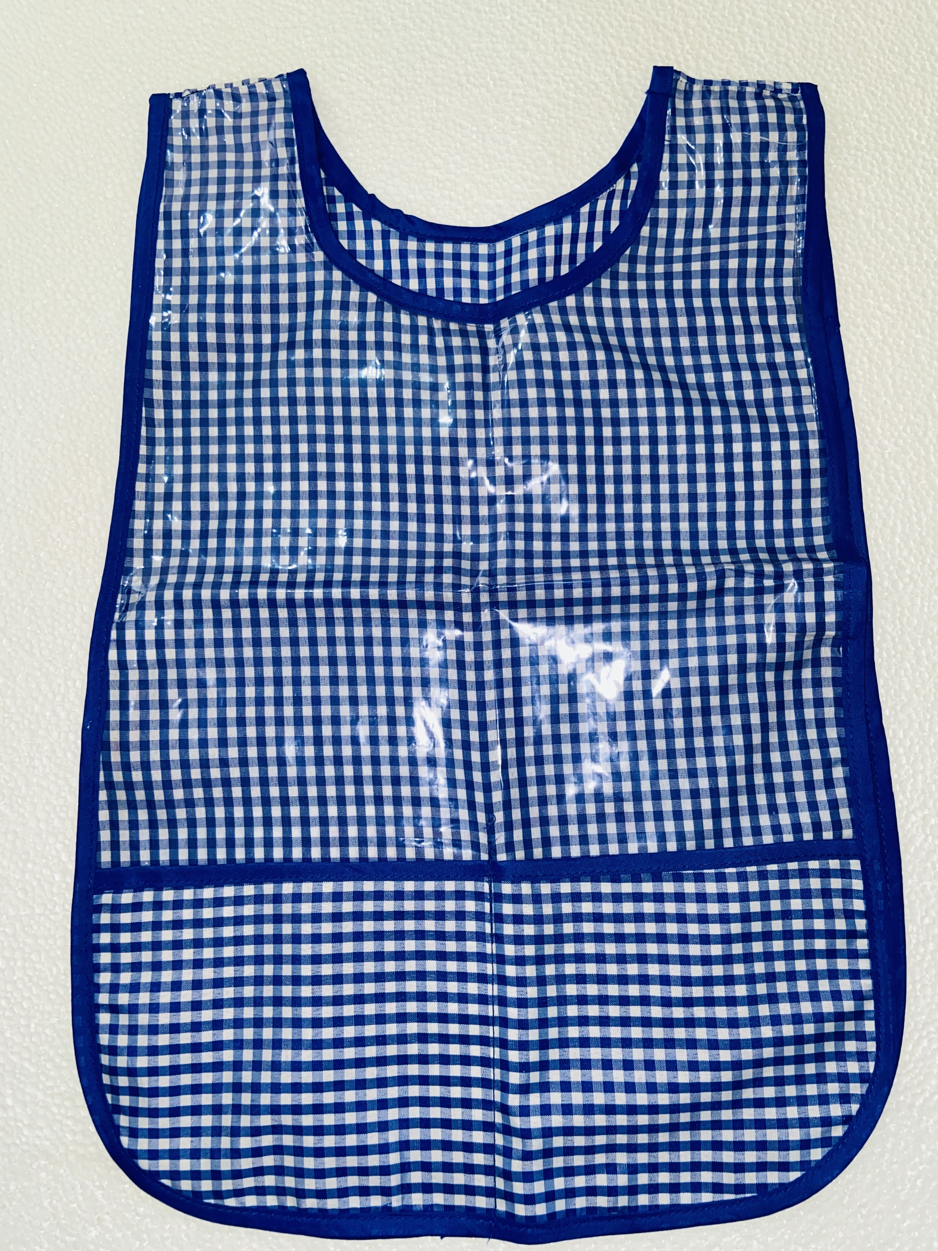 MANDIL INFANTIL DE TELA AZUL REY