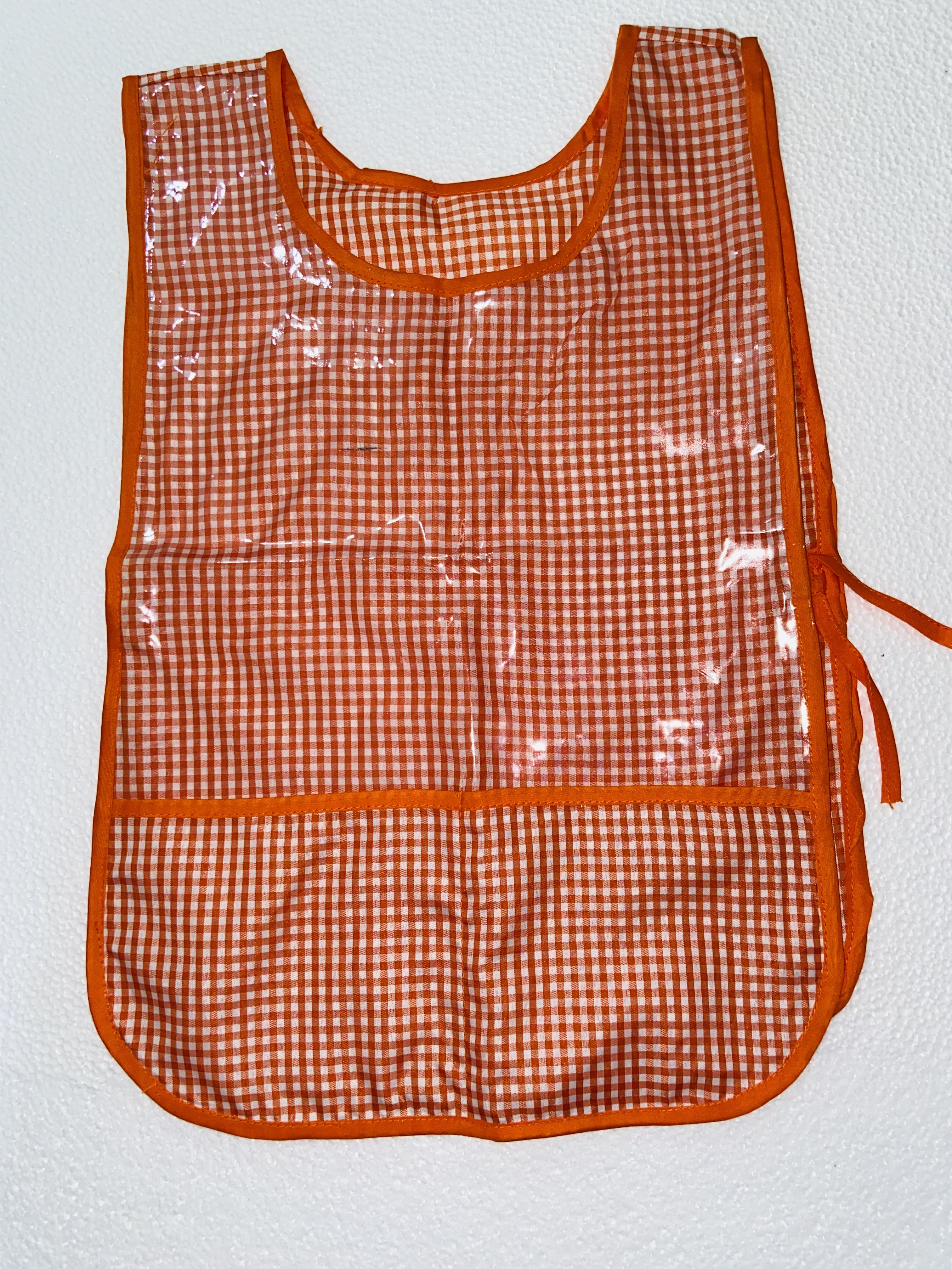 MANDIL INFANTIL DE TELA NARANJA