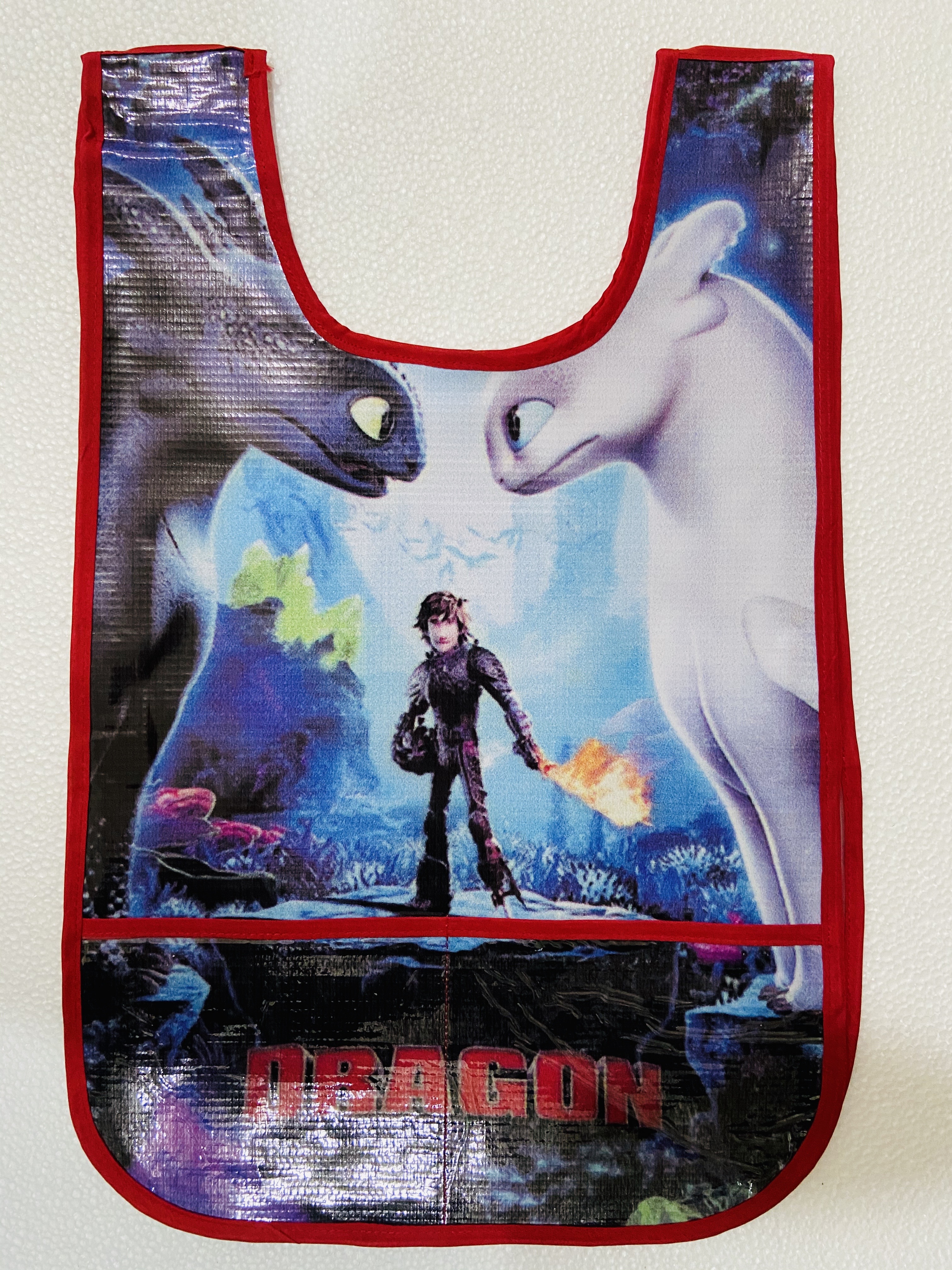 MANDIL INFANTIL PLAST.T/CAMIS.DRAGON     (COMO ENTRENAR A TU