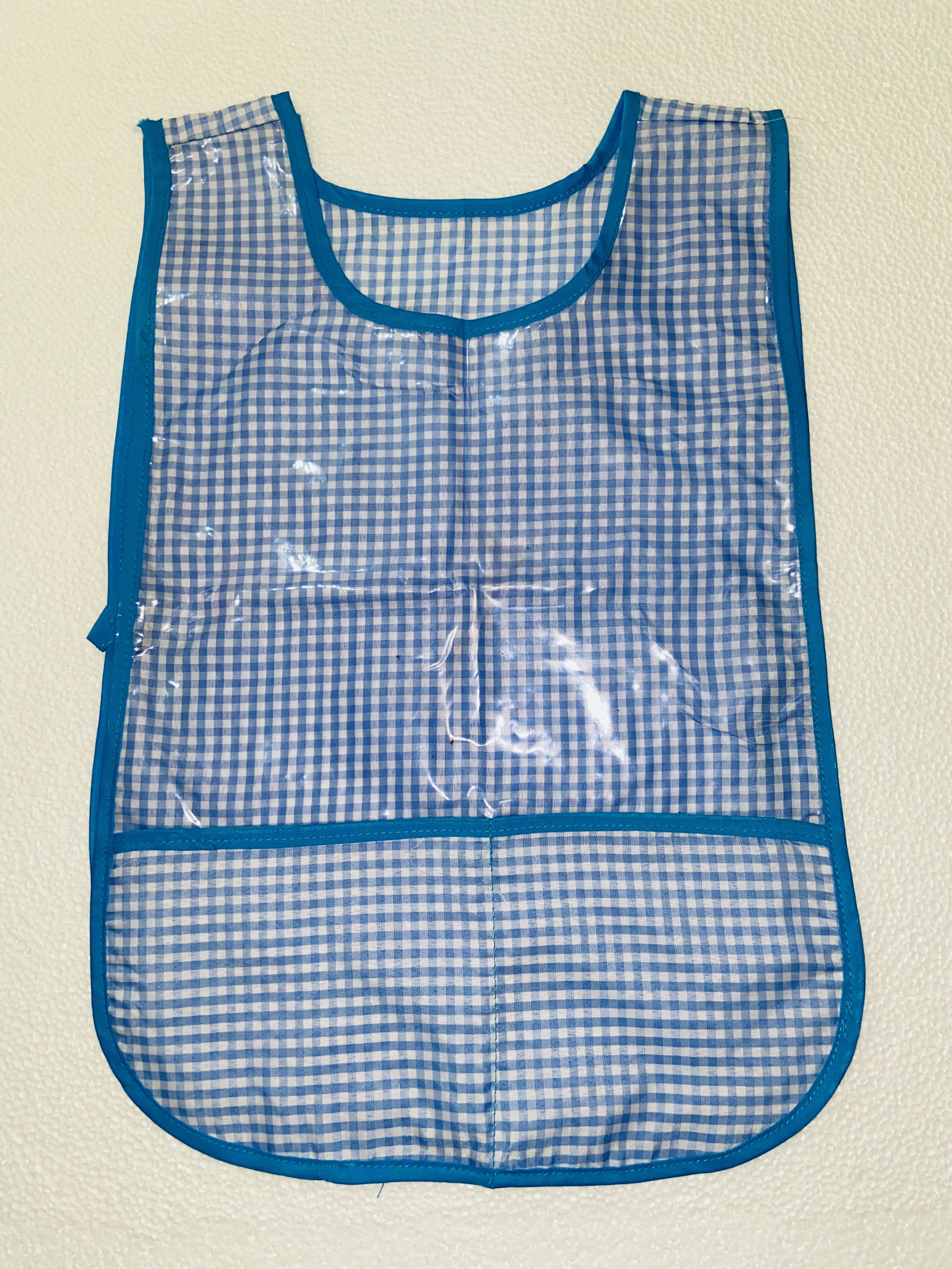 MANDIL INFANTIL DE TELA AZUL CIELO